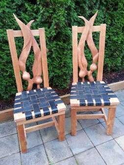 carved kelp chairs with leather seats