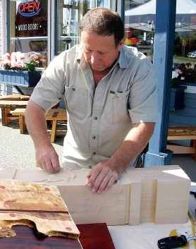 Don Bastian Carving a vine leaf bench