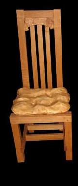 carved wooden cushion on chair