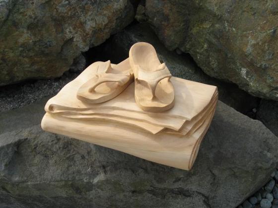 Don Bastian Carved Flippers sitting on towel